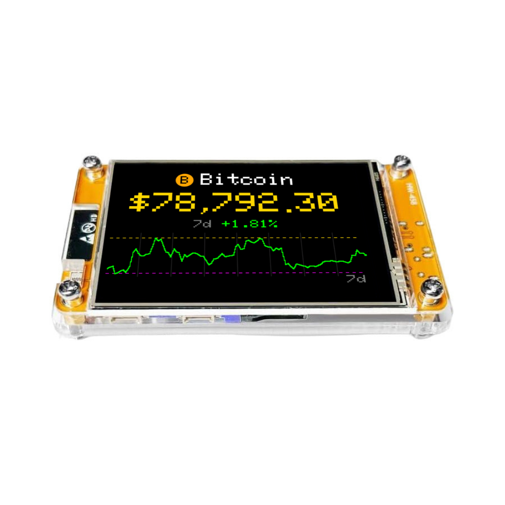 Angled view of TinyHUD desk display running the Bitcoin price app with a 60 day chart